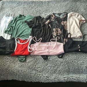 Four body suits & Five Shirt Lot